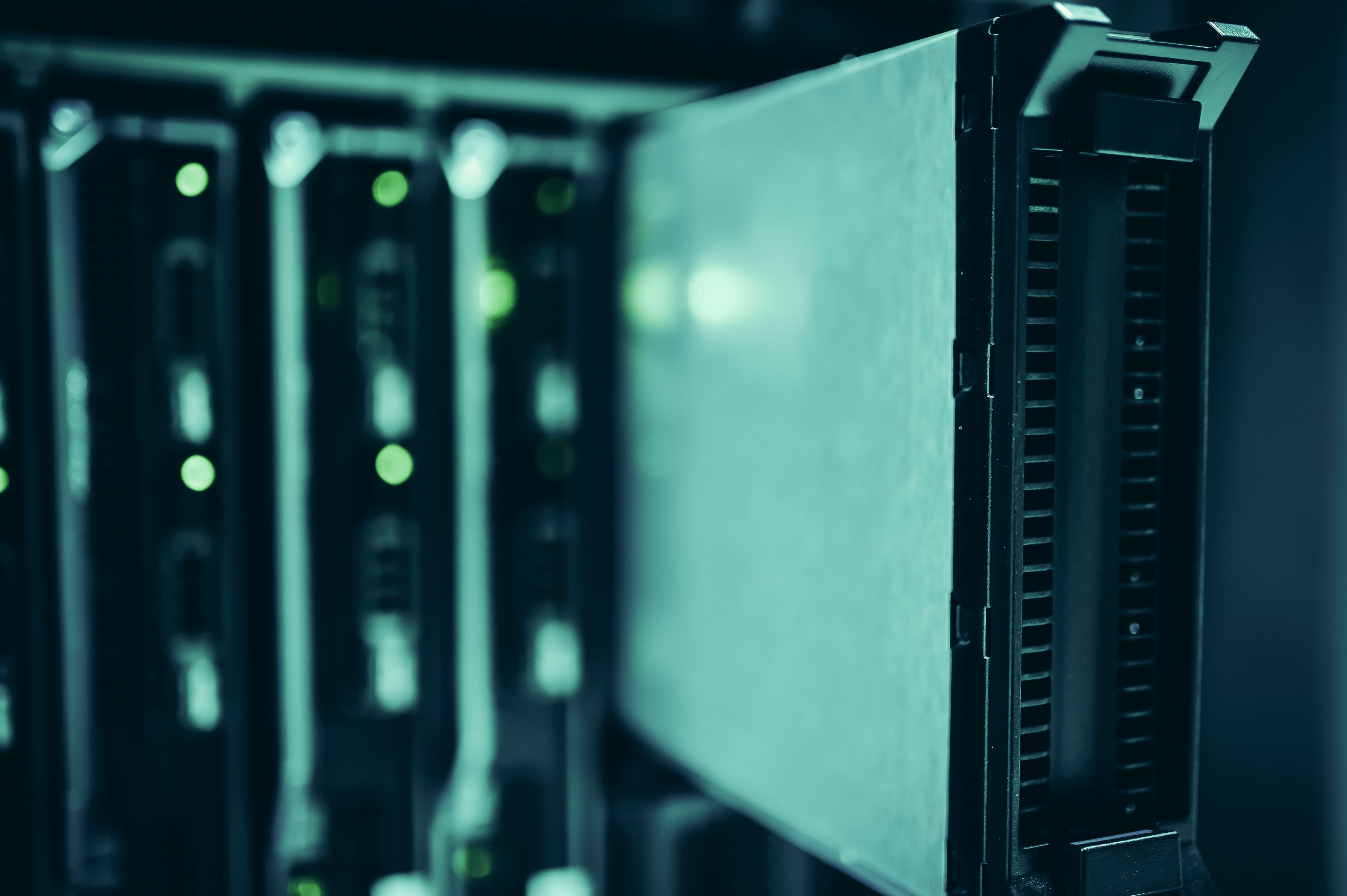 Server racks with status lights in a data centre.